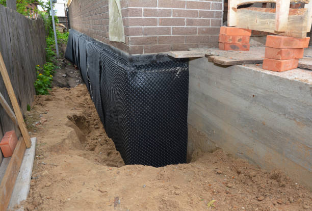 SJ Waterproofing Pros technician performing targeted Interior Drainage System assessment in Vincent, AL
